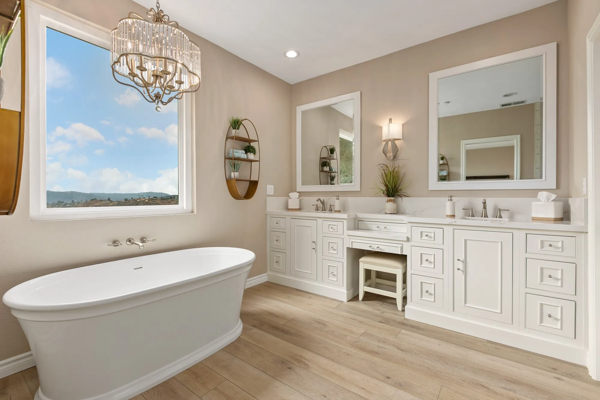 San Diego bathroom remodel with white double vanity, freestanding tub, and natural wood flooring.